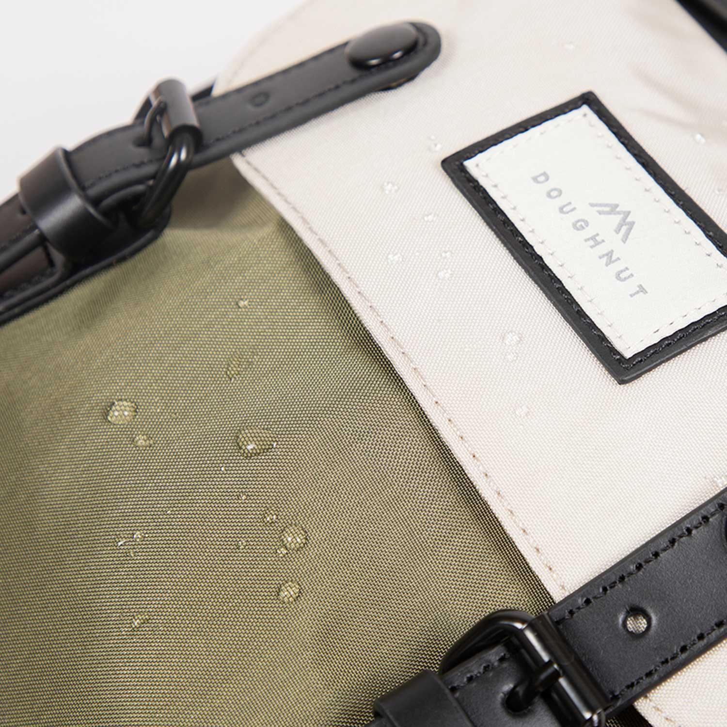 Doughnut Macaroon Large Rucksack - black x slate green